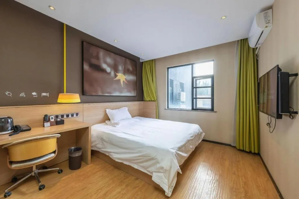 Bed in IU Hotel Kunming Jinma Bijifang Joy City