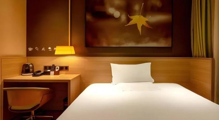 Bed in IU Hotel Kunming Jinma Bijifang Joy City