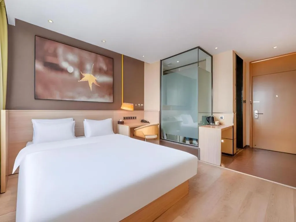 Bed in IU Hotel Kunming Jinma Bijifang Joy City