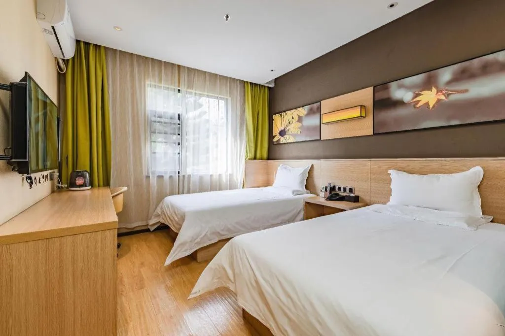 Bed in IU Hotel Kunming Jinma Bijifang Joy City