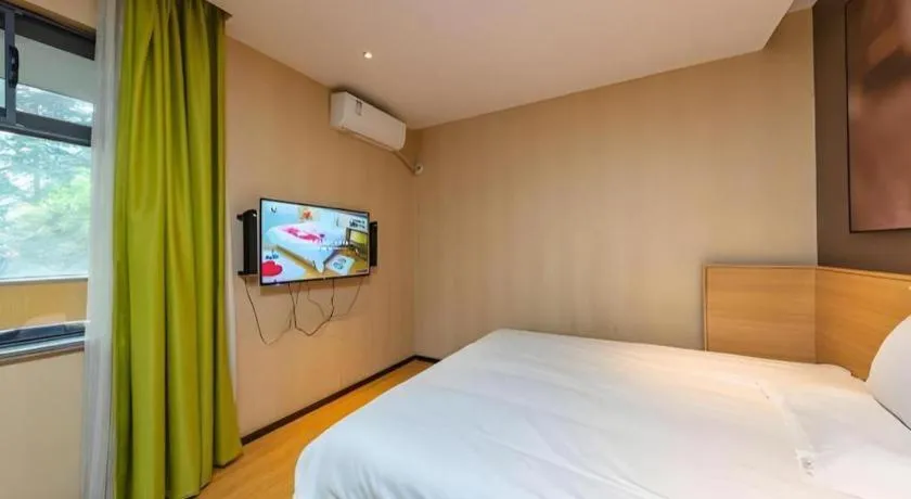 Bed in IU Hotel Kunming Jinma Bijifang Joy City