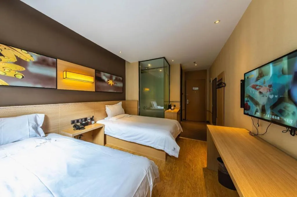 Bed in IU Hotel Kunming Jinma Bijifang Joy City