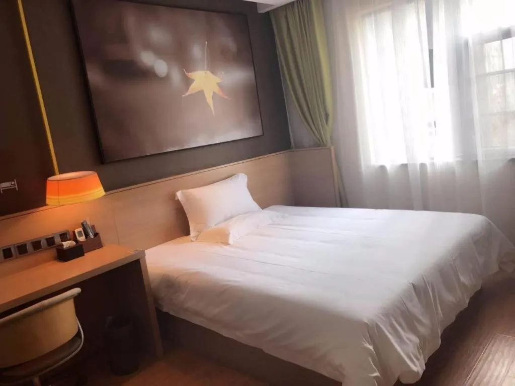 Bed in IU Hotel Kunming Jinma Bijifang Joy City