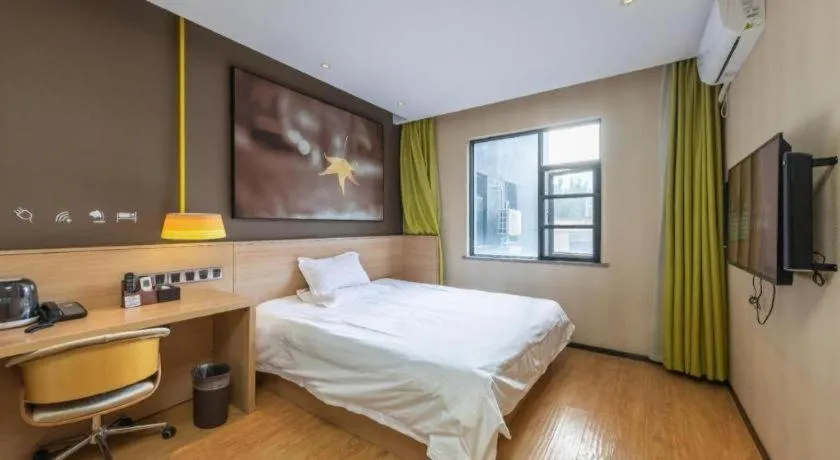 Bed in IU Hotel Kunming Jinma Bijifang Joy City