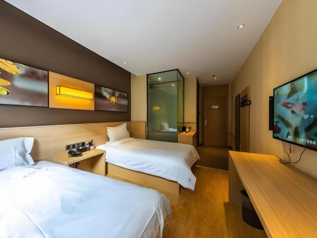 Bed in IU Hotel Kunming Jinma Bijifang Joy City