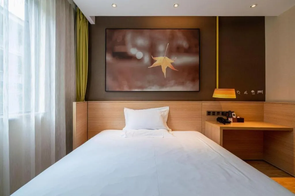 Bed in IU Hotel Kunming Jinma Bijifang Joy City