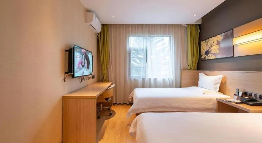 Bed in IU Hotel Kunming Jinma Bijifang Joy City