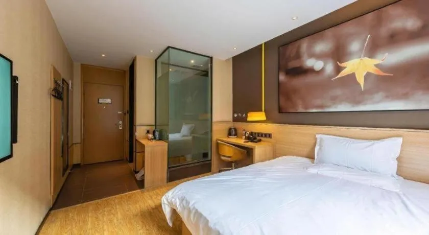 Bed in IU Hotel Kunming Jinma Bijifang Joy City