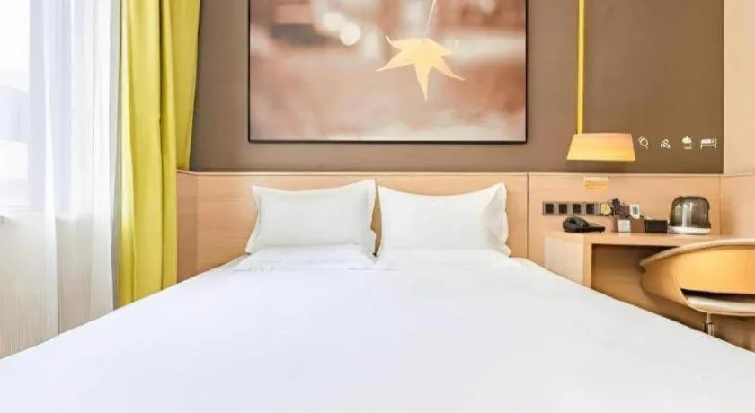 Bed in IU Hotel Kunming Jinma Bijifang Joy City