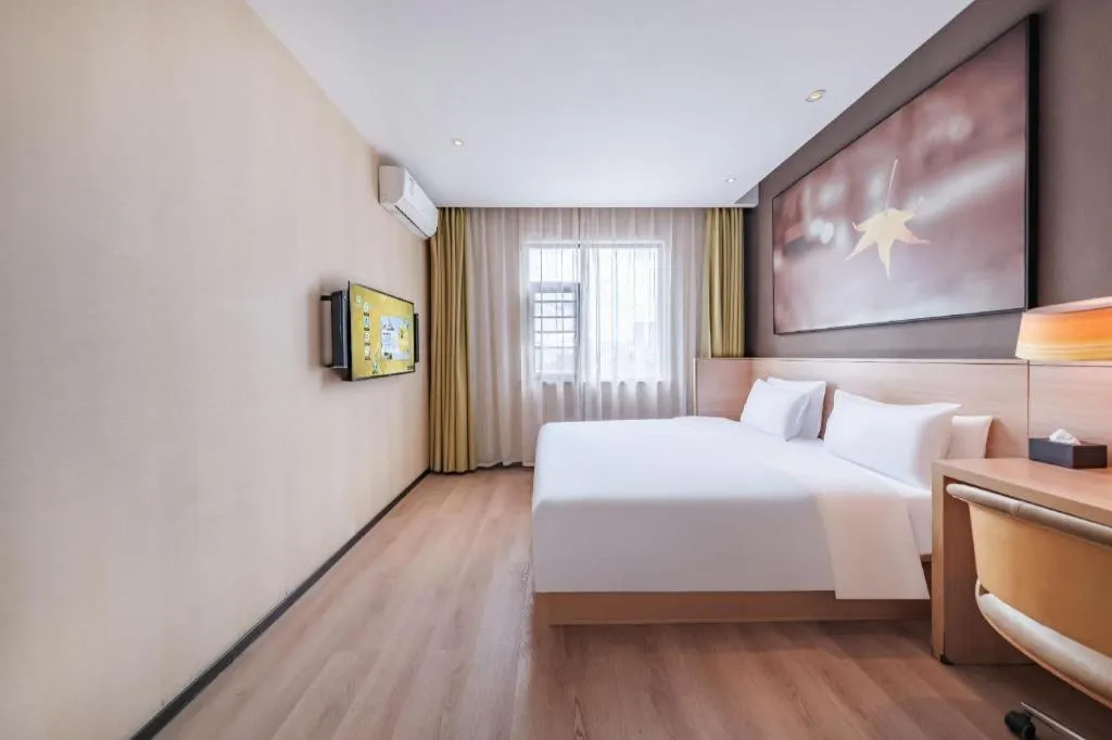 Bed in IU Hotel Kunming Jinma Bijifang Joy City