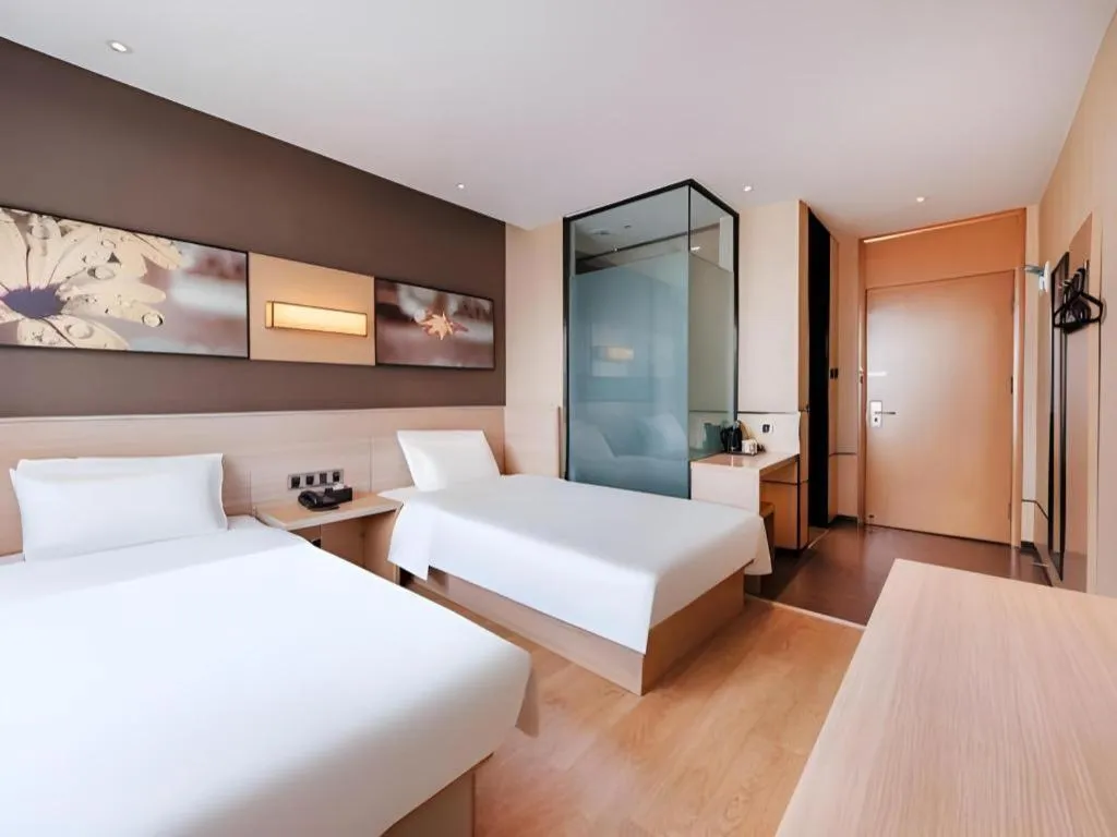 Bed in IU Hotel Kunming Jinma Bijifang Joy City