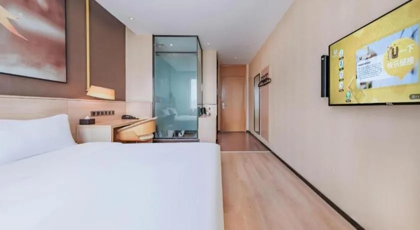Bed in IU Hotel Kunming Jinma Bijifang Joy City