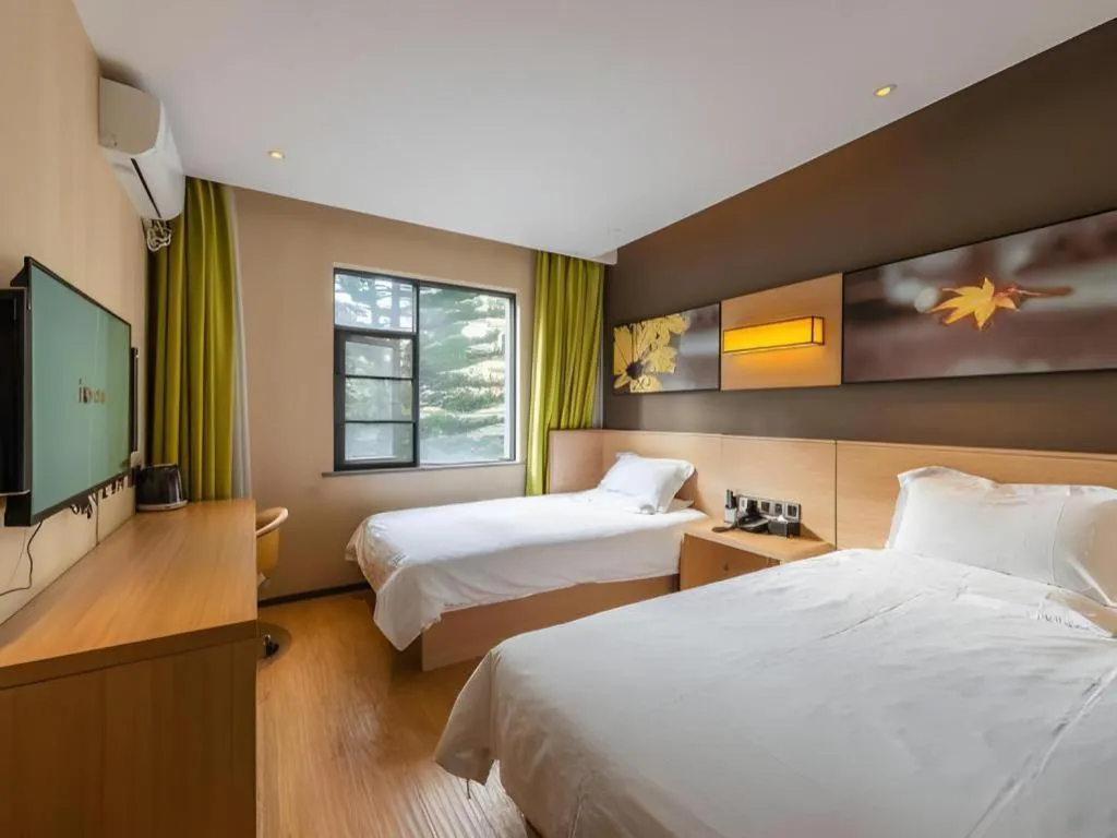 Bed in IU Hotel Kunming Jinma Bijifang Joy City
