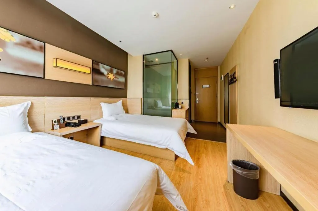 Bed in IU Hotel Kunming Jinma Bijifang Joy City