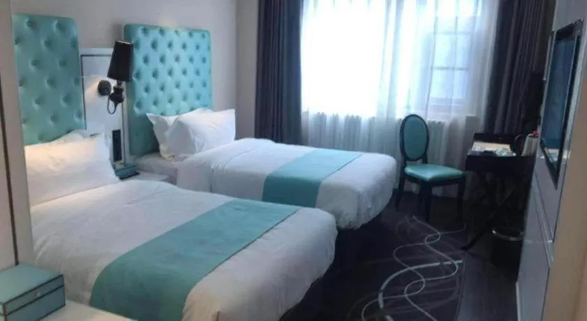 Bed in Xana Hotelle·JiNan Daminghu East Gate Shandong University