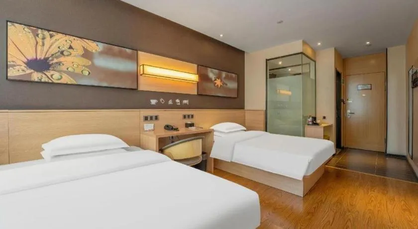 Bed in IU Hotels Xinzhou Bus Terminal