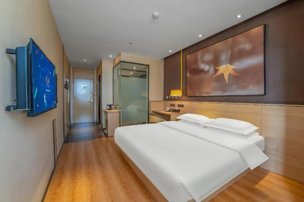 Bed in IU Hotels Xinzhou Bus Terminal