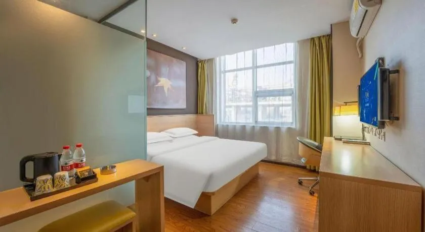 Bed in IU Hotels Xinzhou Bus Terminal