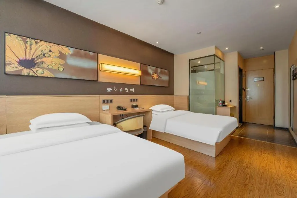 Bed in IU Hotels Xinzhou Bus Terminal