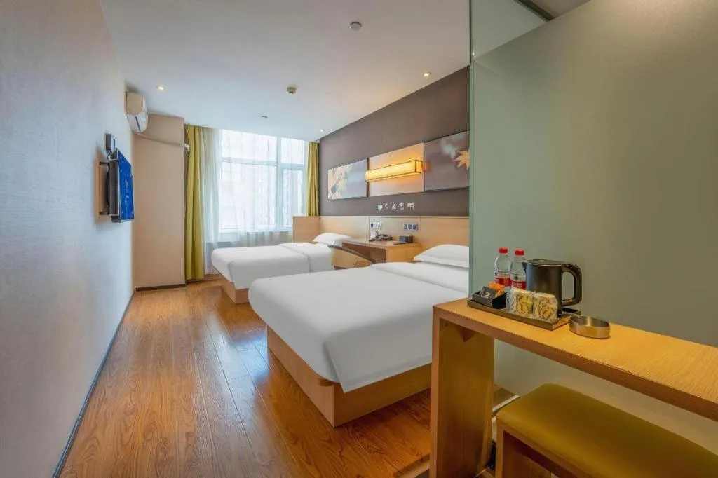 Bed in IU Hotels Xinzhou Bus Terminal