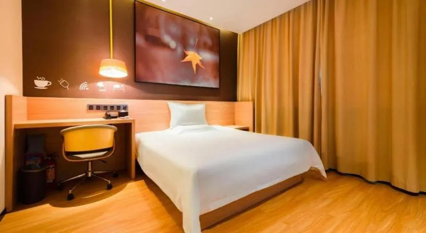Bed in IU Hotels Xinzhou Bus Terminal
