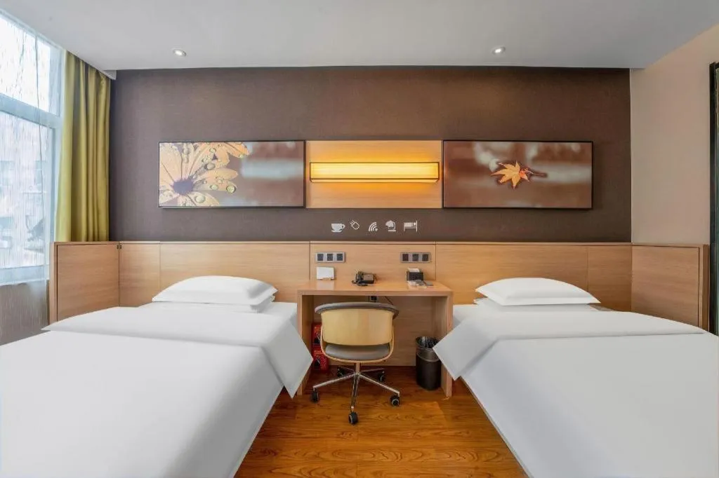 Bed in IU Hotels Xinzhou Bus Terminal