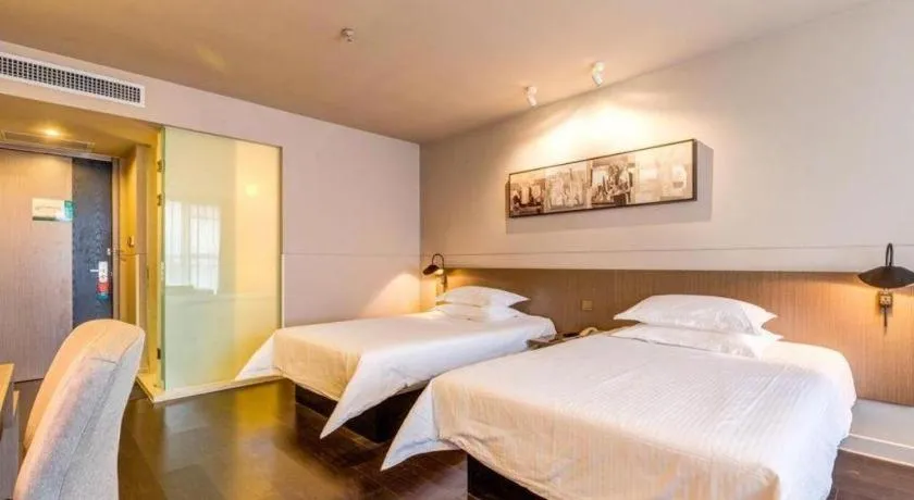 Bed in Jinjiang Inn Select Xixian New Distict Century Avenue