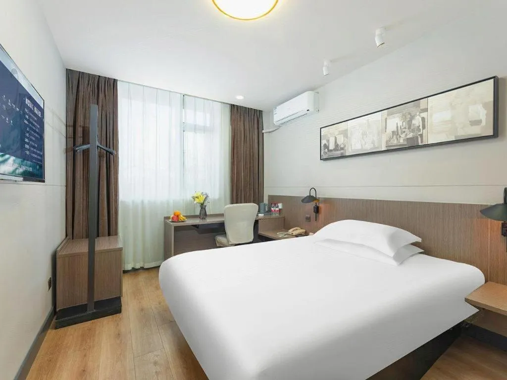 Bed in Jinjiang Inn Select Tianjin Xiaobailou Metro Station