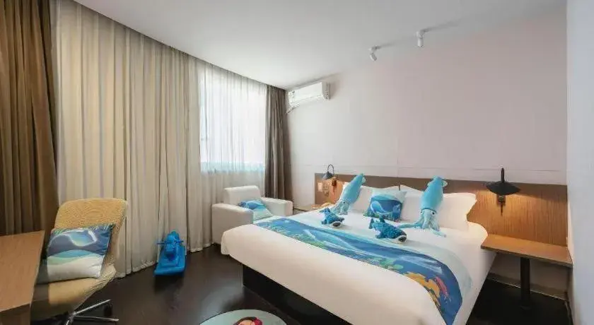 Bed in Magnotel Hotel Shanghai Railway Station Magnolia Plaza Bed in Magnotel Hotel Shanghai Railway Station Magnolia Plaza