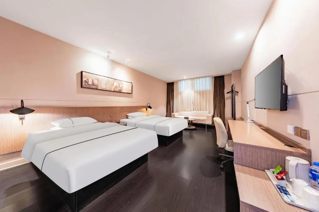 Bed in Jinjiang Inn Select Hohhot Chengjisihan Square Metro Station