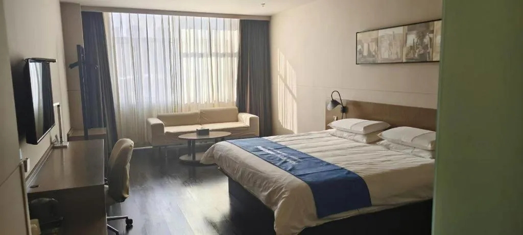 Bed in Jinjiang Inn Select Hohhot Chengjisihan Square Metro Station