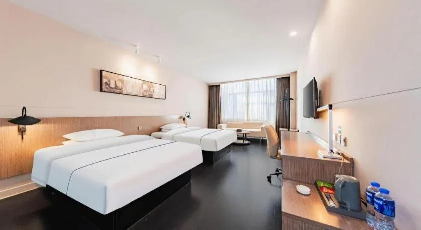 Bed in Jinjiang Inn Select Hohhot Chengjisihan Square Metro Station