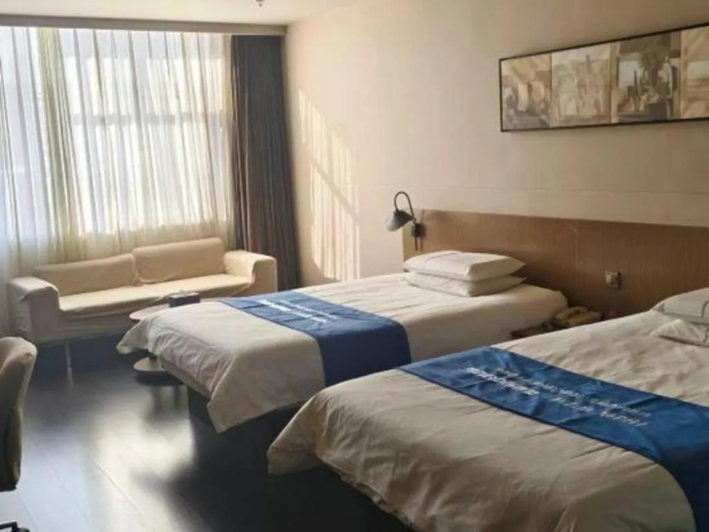 Bed in Jinjiang Inn Select Hohhot Chengjisihan Square Metro Station