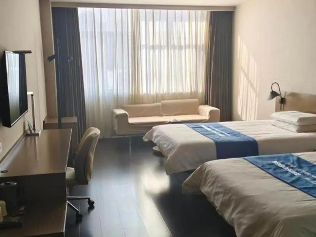 Bed in Jinjiang Inn Select Hohhot Chengjisihan Square Metro Station