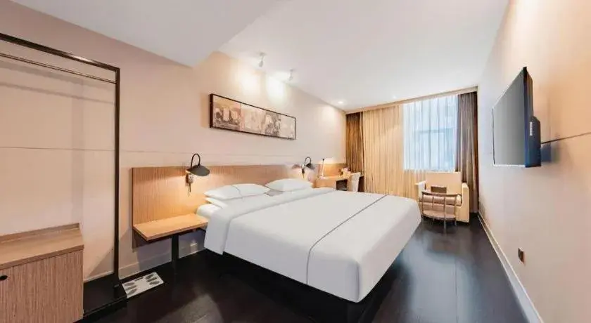 Bed in Jinjiang Inn Select Hohhot Chengjisihan Square Metro Station Bed in Jinjiang Inn Select Hohhot Chengjisihan Square Metro Station