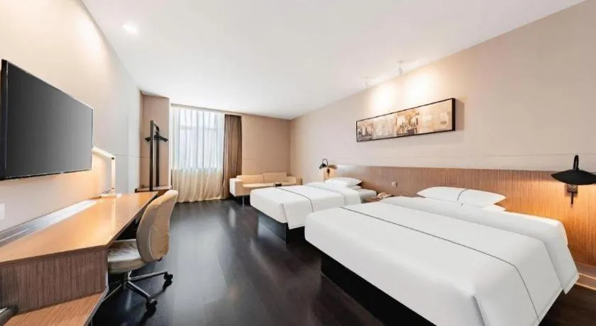 Bed in Jinjiang Inn Select Hohhot Chengjisihan Square Metro Station