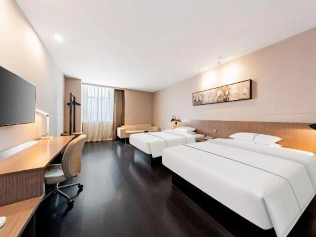 Bed in Jinjiang Inn Select Hohhot Chengjisihan Square Metro Station