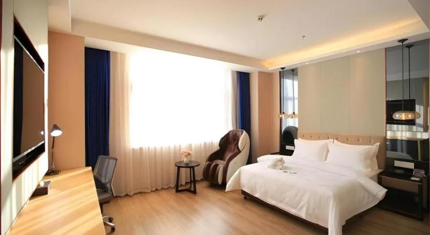 Bed in Jinjiang Metropolo Fuxin Yingbin Street Railway Station