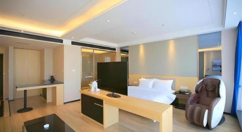 Bed in Jinjiang Metropolo Fuxin Yingbin Street Railway Station