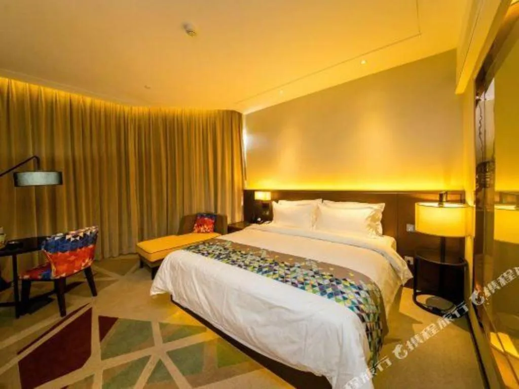 Bed in ZMAX Hotel Guangzhou Luogang Science City Shenzhou Road Metro Station