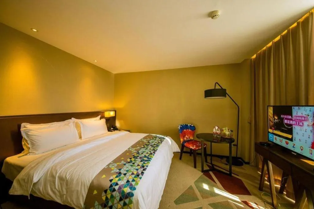 Bed in ZMAX Hotel Guangzhou Luogang Science City Shenzhou Road Metro Station