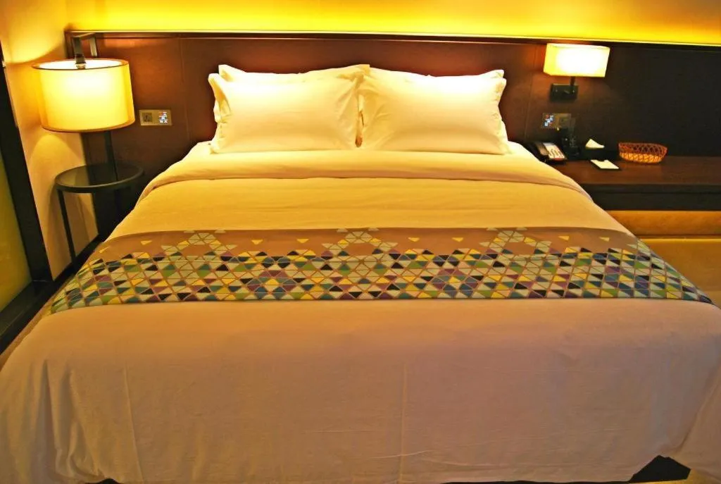 Bed in ZMAX Hotel Guangzhou Luogang Science City Shenzhou Road Metro Station