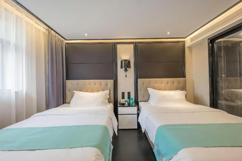 Bed in Xana Hotelle·Nanchang Bayi Square Metro Station