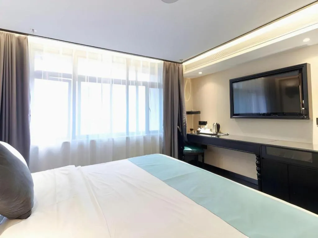 Bed in Xana Hotelle·Nanchang Bayi Square Metro Station