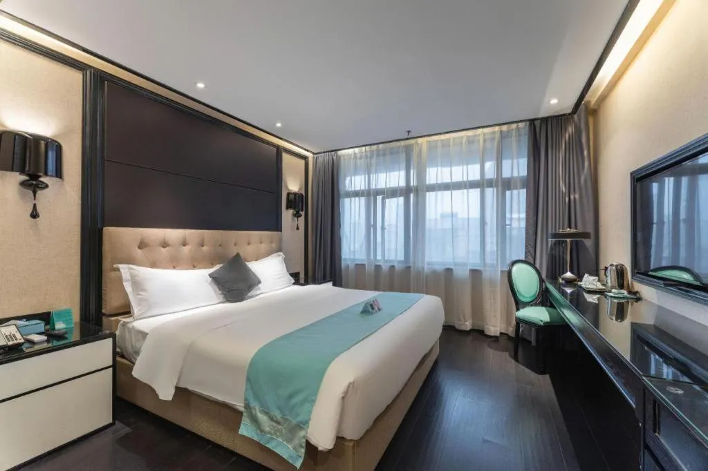 Bed in Xana Hotelle·Nanchang Bayi Square Metro Station