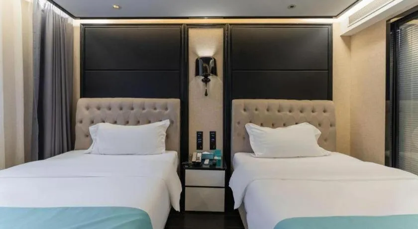 Bed in Xana Hotelle·Nanchang Bayi Square Metro Station