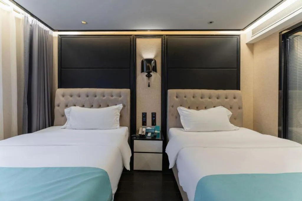 Bed in Xana Hotelle·Nanchang Bayi Square Metro Station