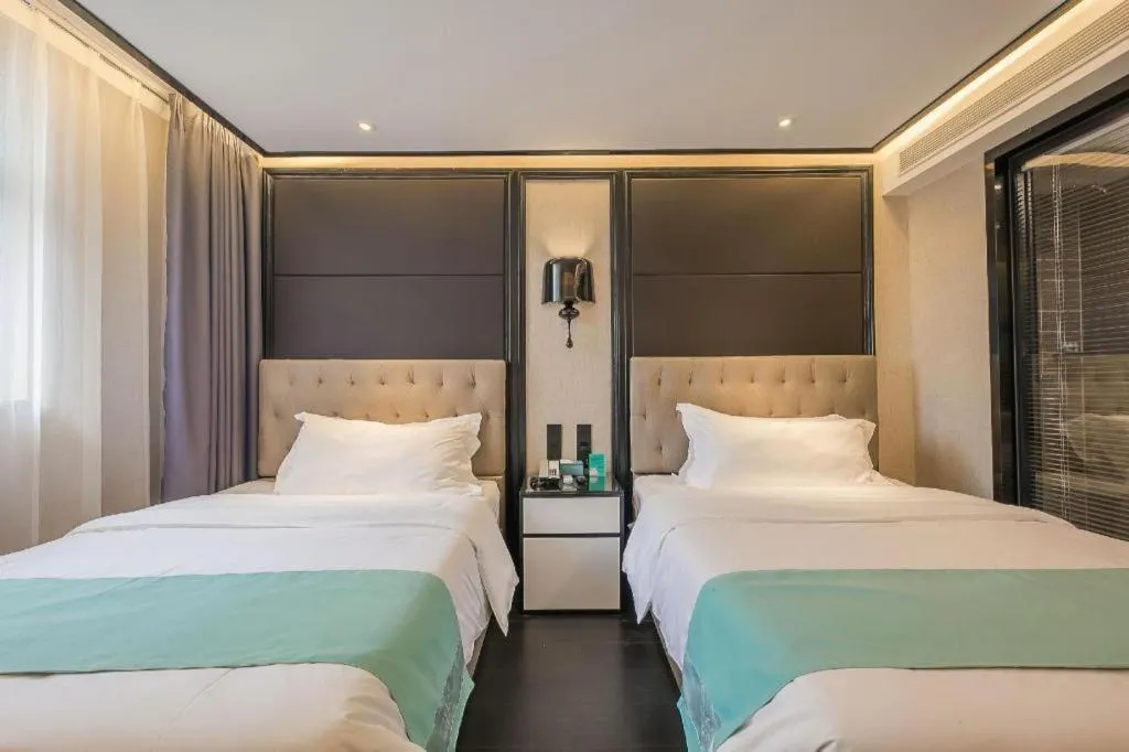 Bed in Xana Hotelle·Nanchang Bayi Square Metro Station