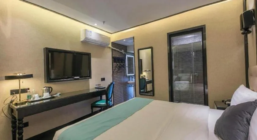 Bed in Xana Hotelle·Nanchang Bayi Square Metro Station