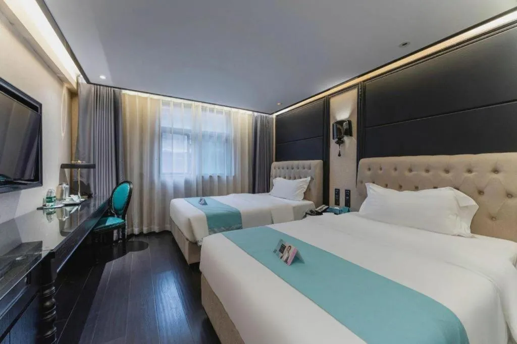 Bed in Xana Hotelle·Nanchang Bayi Square Metro Station